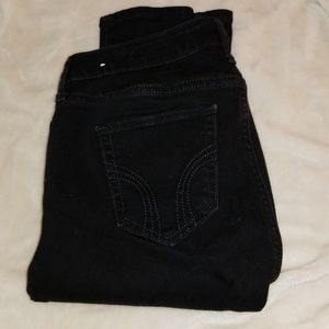 Black skinny jeans with distressed knees